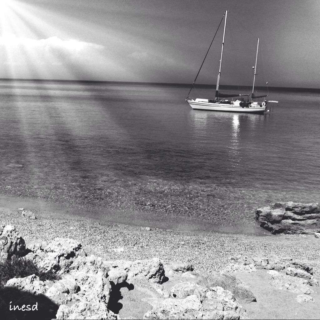 sea, nautical vessel, transportation, water, mode of transport, boat, horizon over water, moored, beach, tranquility, tranquil scene, sky, scenics, shore, beauty in nature, nature, travel, sailboat, outdoors, idyllic