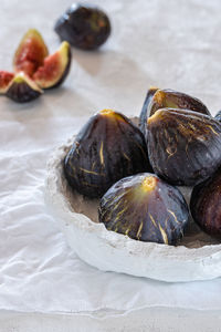 Close-up of figs on table