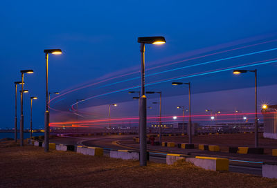 Illuminated street lights at night