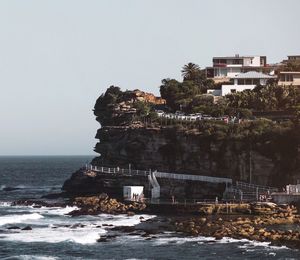 View of sea with buildings in background