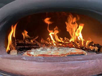 Close-up of burning pizza oven fire