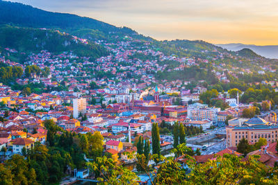 High angle view of townscape against sky during sunset