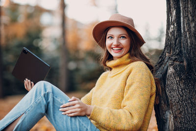 Young woman using digital tablet