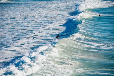 High angle view of people in sea