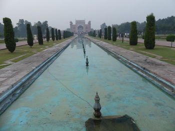 Distant view of entrance gate from taj mahal built by shah jahan in 1632 - 1653 in the early morning