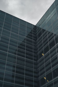 Low angle view of modern building against sky