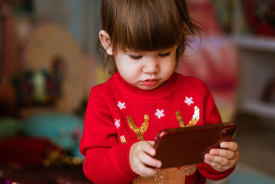 Close-up of boy using digital tablet