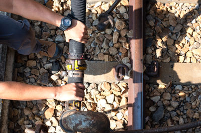 Man working on pebbles