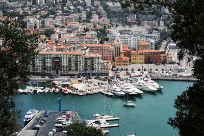 High angle view of buildings by sea