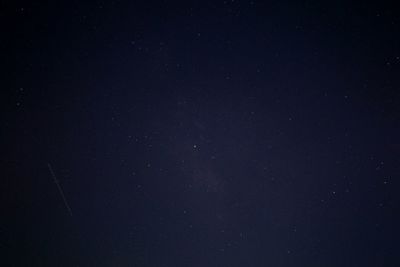 Low angle view of stars against sky at night