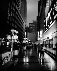 Woman standing in city