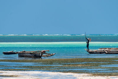 Scenic view of sea against clear sky