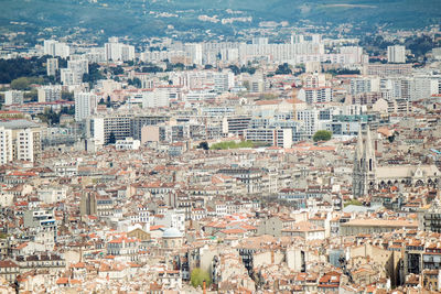 High angle view of residential district and buildings in city