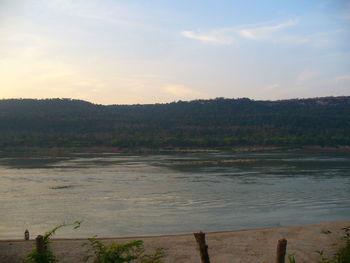 Scenic view of sea at sunset