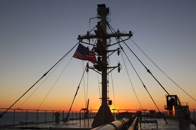 The mast unfurls the star sprangled banner