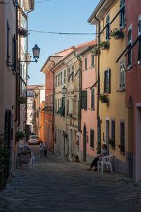 Narrow alley with buildings in background