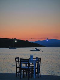 Scenic view of sea against sky at sunset