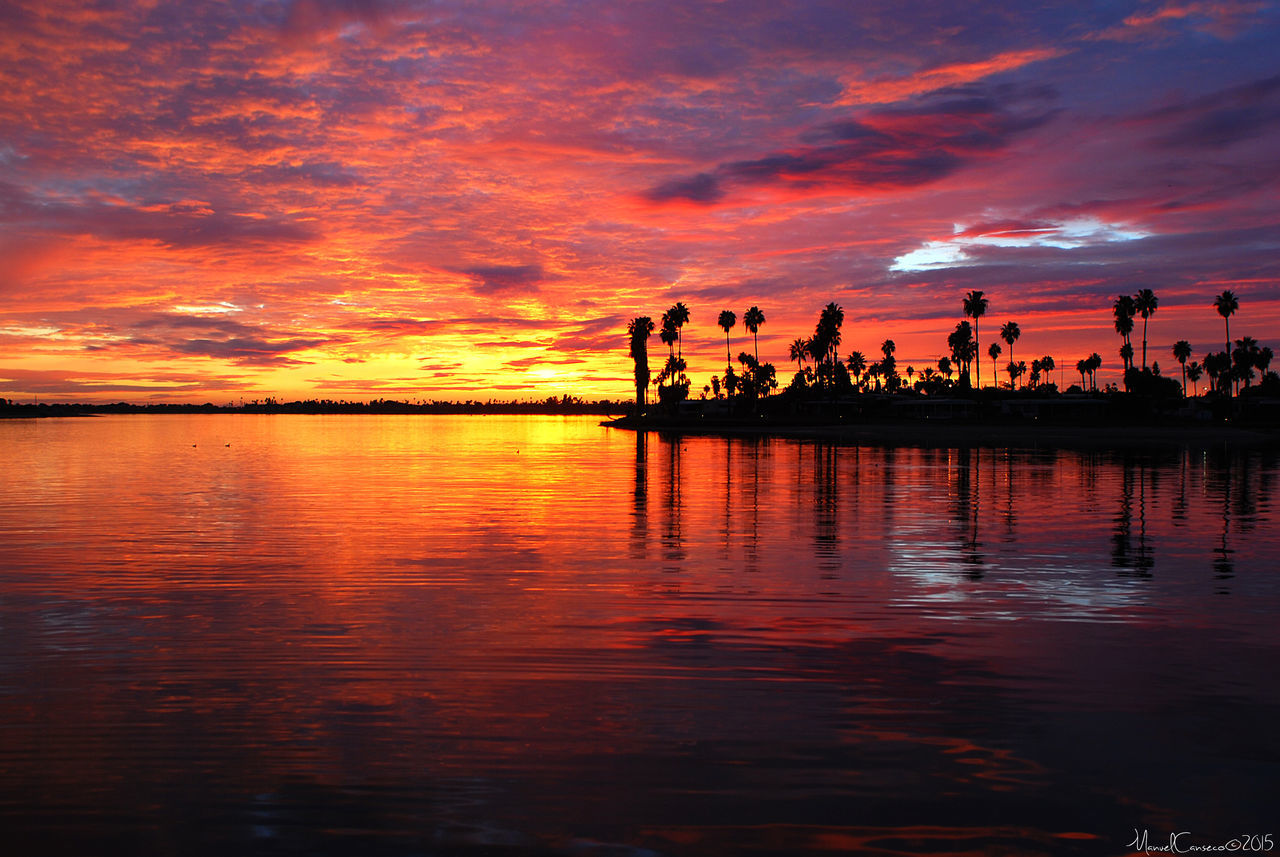 SCENIC VIEW OF SUNSET OVER SEA