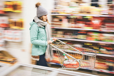 Side view of a woman in a store