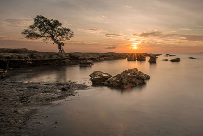 Scenic view of sea against sky during sunset