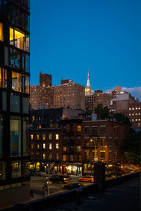 Illuminated buildings in city