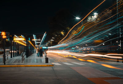 Light trails on city street at night