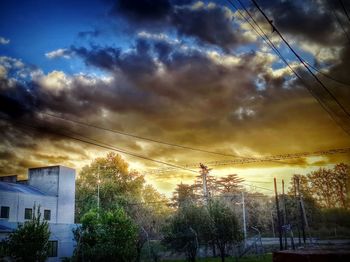 Scenic view of cloudy sky at sunset