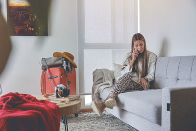 Portrait of woman using mobile phone