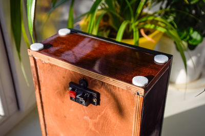 Close-up of guitar on table