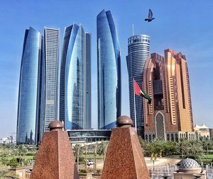 Modern buildings in city against sky