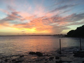 Scenic view of sea at sunset