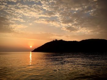 Scenic view of sea against sky during sunset