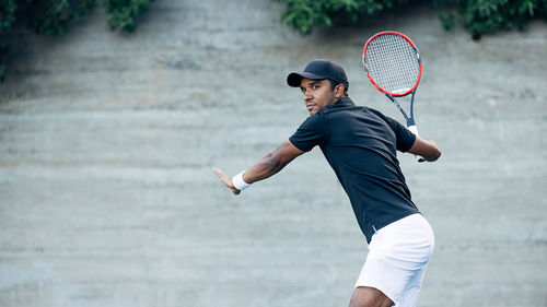 Man playing tennis