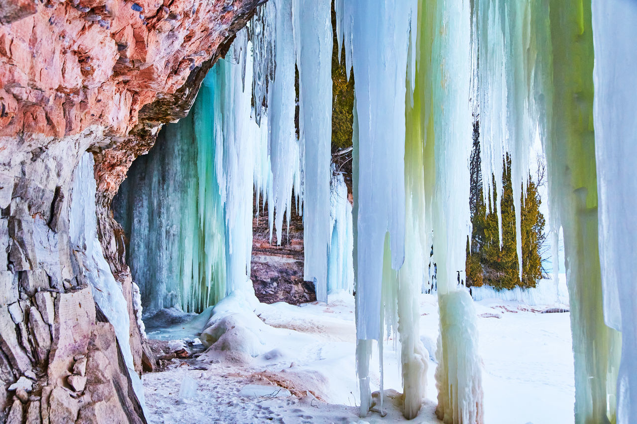 cave, cold temperature, beauty in nature, nature, no people, winter, snow, formation, ice, environment, scenics - nature, day, tree, frozen, land, tranquility, outdoors, non-urban scene, plant, landscape, icicle, tree trunk