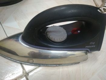 Close-up of old telephone on table