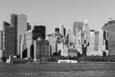 Modern buildings in city against sky