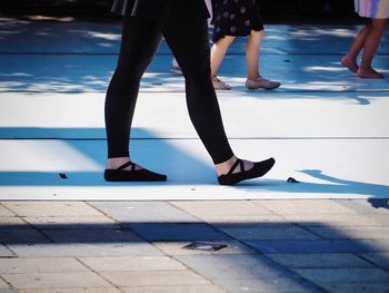 Low section of women on street