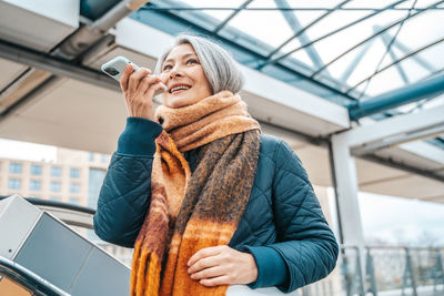 Young woman using mobile phone