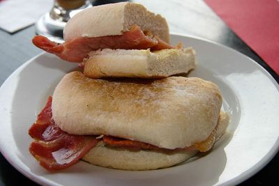 Close-up of bacon sandwich served in plate