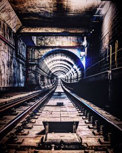 Railroad tracks in tunnel