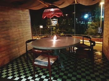 Table and chairs at night