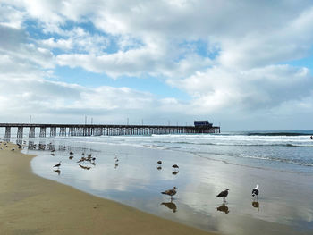 Scenic view of beach against sky