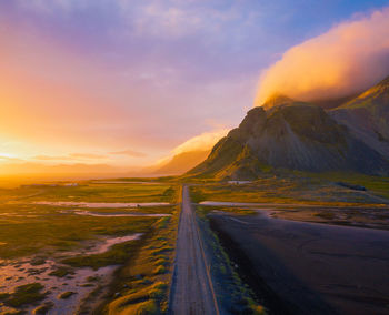 Scenic view of landscape against sky during sunset