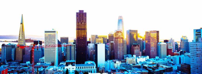 Modern buildings in city against sky