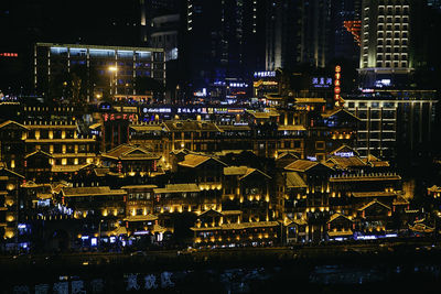 High angle view of illuminated buildings at night