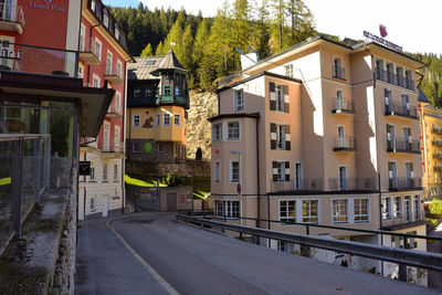 Street by buildings in city