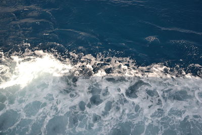 High angle view of waves in sea