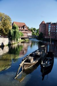 Boats in front of historic houses