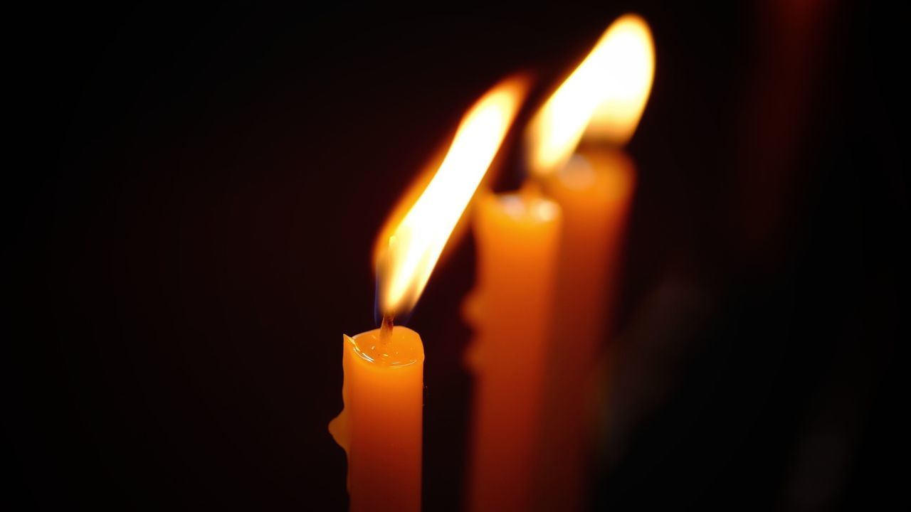 burning, flame, fire, heat - temperature, fire - natural phenomenon, candle, glowing, illuminated, indoors, close-up, nature, orange color, dark, focus on foreground, darkroom, no people, wax, domestic room, religion, copy space, luminosity, black background, melting