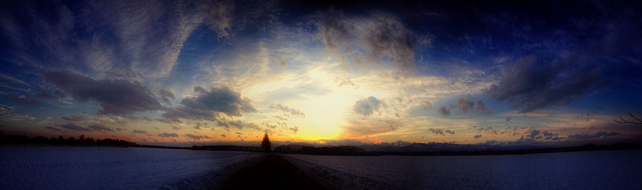 scenics, tranquil scene, sky, tranquility, beauty in nature, sunset, nature, water, cloud - sky, the way forward, idyllic, cloud, non-urban scene, dusk, sea, diminishing perspective, cloudy, landscape, outdoors, remote